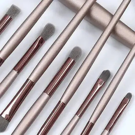 Champagne gold contour blush and powder makeup brushes