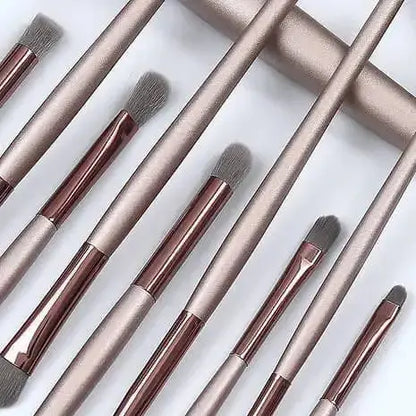 Champagne gold contour blush and powder makeup brushes